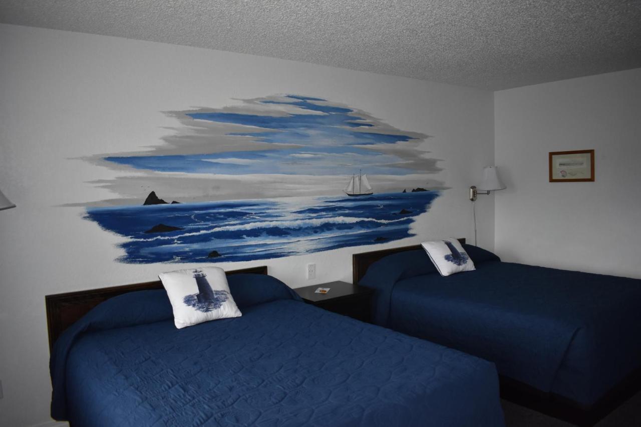 Lighthouse Cove Inn Bandon Dış mekan fotoğraf A room at the motel