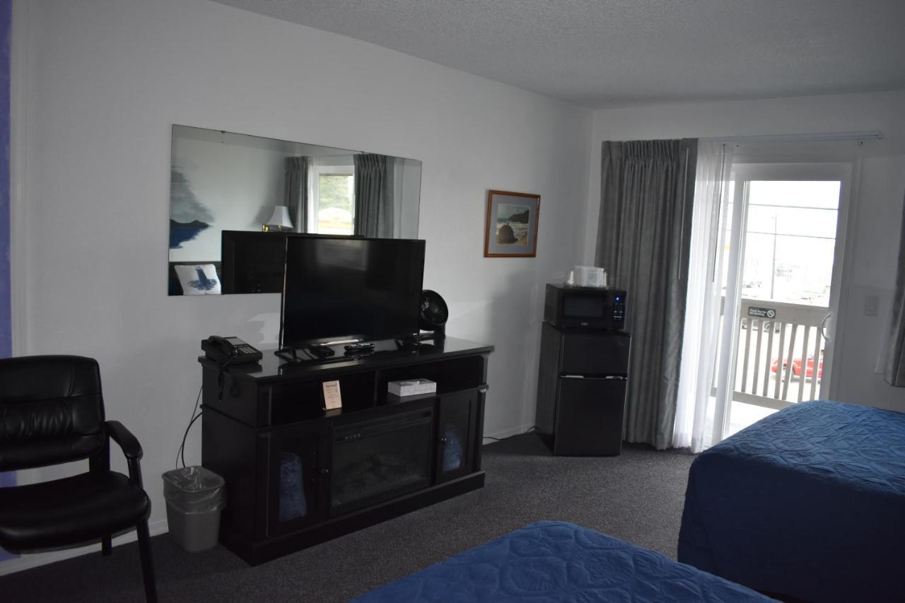 Lighthouse Cove Inn Bandon Dış mekan fotoğraf A typical room at the motel